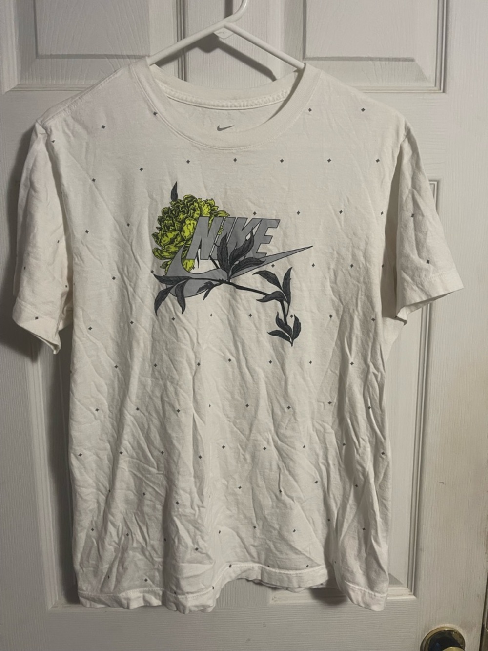 Nike White Short-Sleeve Tee with Green Floral Logo